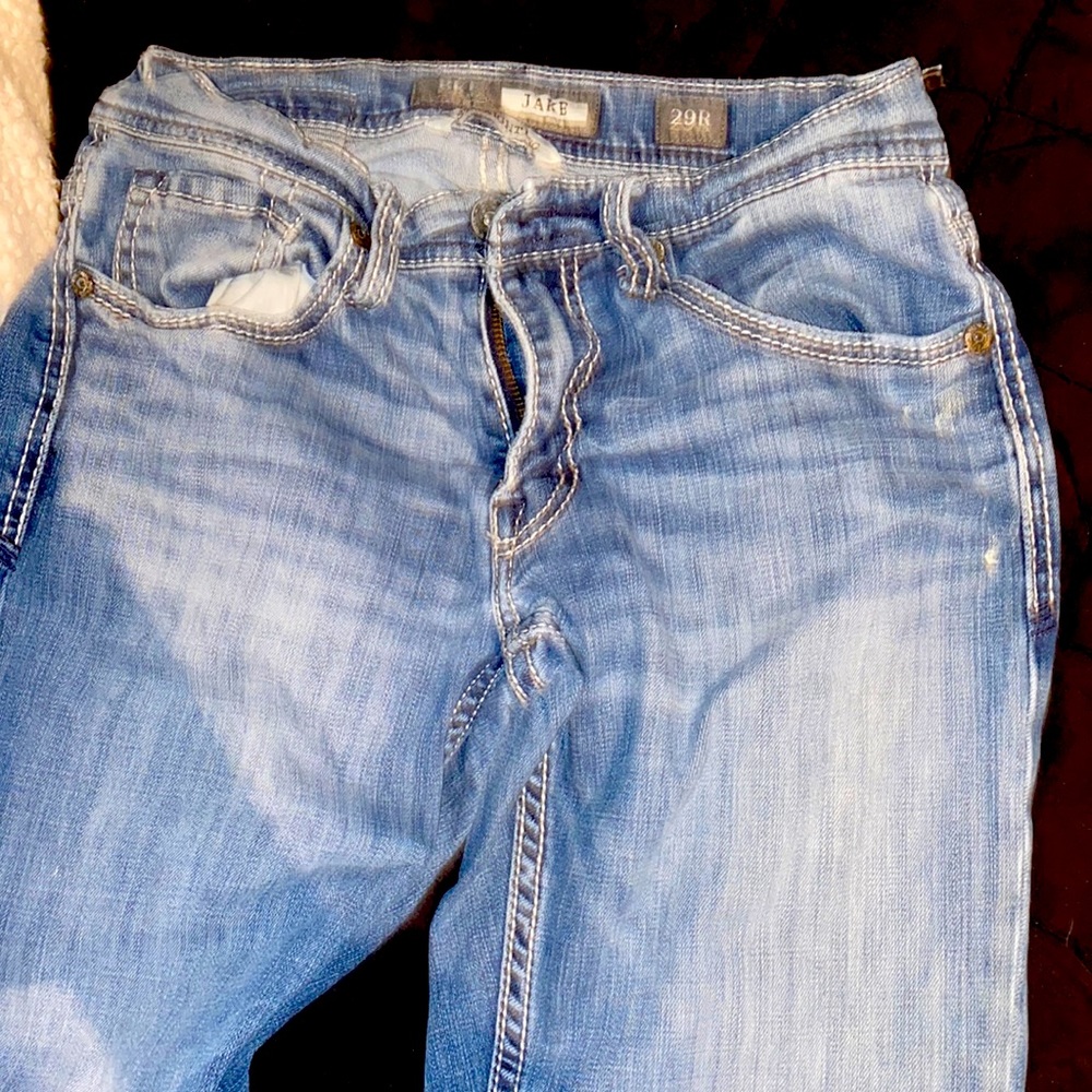 Buckle blue jeans
